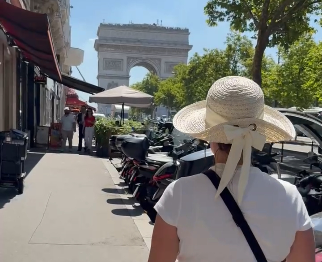 Personal travel planner, Kathleen Hesketh, walks down the Champs-Elysées in Paris.