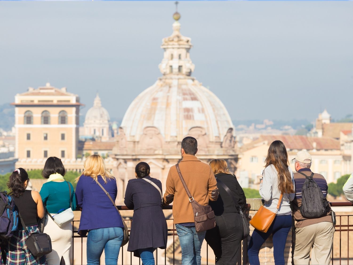 People on a group travel tour enjoying culturally enriching sites